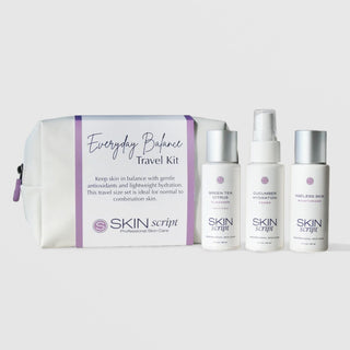 Skin Script Everyday Balance Travel Kit with white cosmetic bag and three travel-size products: Green Tea Citrus Cleanser, Cucumber Hydration Toner, and Ageless Skin Moisturizer for normal to combination skin