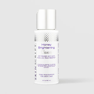 Skin Script Honey Brightening Cleanser with Mandelic and Lactic Acids – white bottle with silver flip-top cap, 2 fl oz / 60ml
