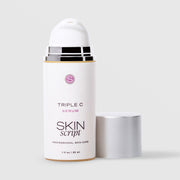Skin Script Triple C Serum Vitamin C brightening facial serum – white airless pump bottle with gold accent band and silver cap removed showing pump head, 1 fl oz / 30ml
