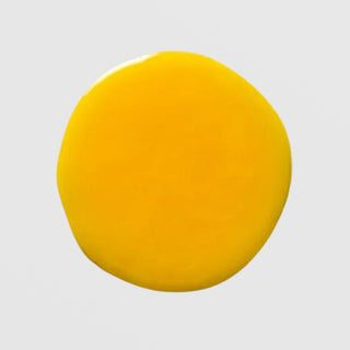 Skin Script Advanced Renewal Serum texture drop showing vibrant bright yellow serum formula on grey background.