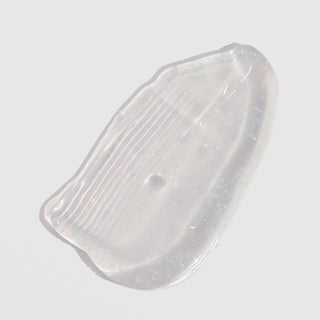 Skin Script Ageless Lip Treatment texture swatch showing clear translucent gel with smooth glossy consistency and subtle iridescent shimmer. Available at Art of Skin Care