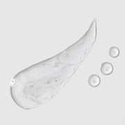 Skin Script Light Aloe Moisturizer texture swatch showing ultra-lightweight clear aloe gel formula with water droplets on grey background.