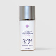 Skin Script Professional Skin Care Mandelic Brightening Serum 1 oz pump bottle with silver cap on grey background.
