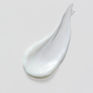 Skin Script Peptide Moisturizer texture swatch showing smooth glossy white cream formula on grey background.