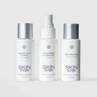 Skin Script Everyday Balance Travel Kit featuring three 2oz bottles: Green Tea Citrus Cleanser, Cucumber Hydration Toner, and Ageless Skin Moisturizer on light gray background