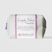Skin Script Everyday Balance Travel Kit white cosmetic bag with purple zipper and branded band, gentle antioxidant skincare set for normal to combination skin