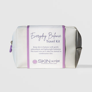 Skin Script Everyday Balance Travel Kit white cosmetic bag with purple zipper and branded band, gentle antioxidant skincare set for normal to combination skin