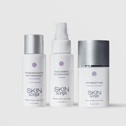 Skin Script Fully Quenched Travel Kit featuring three bottles: Pomegranate Antioxidant Cleanser 2oz, Cucumber Hydration Toner 2oz, and Hydrating Moisturizer 1.7oz on light gray background