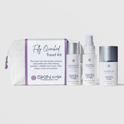 Skin Script Fully Quenched Travel Kit with white cosmetic bag and three travel-size products: Pomegranate Antioxidant Cleanser, Cucumber Hydration Toner, and Hydrating Moisturizer
