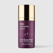 Skinbetter Ampra Volumizing Serum travel size on a grey background