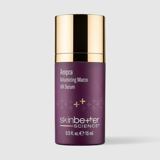 Skinbetter Ampra Volumizing Serum travel size on a grey background