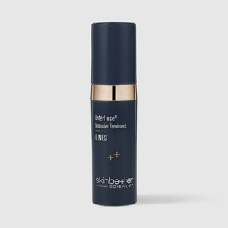 A dark navy blue cosmetic bottle with a metallic gold band and gold text, labeled 'InterFuse Intensive Treatment LINES' by 'skinbetter SCIENCE', on a light gray background.