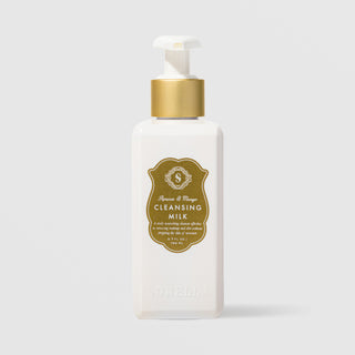 Sorella Apothecary Apricot and Mango Cleansing Milk 5.7 oz in a white pump bottle with gold shield label on a light gray background