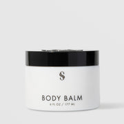 Sorella Apothecary Body Balm 6 fl oz in a white jar with black lid on a light gray background