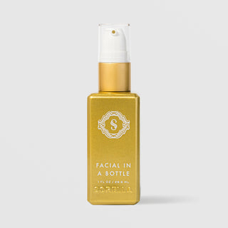 Sorella Apothecary Facial in a Bottle 1 fl oz in a gold metallic pump bottle with white ornate logo on a light gray background
