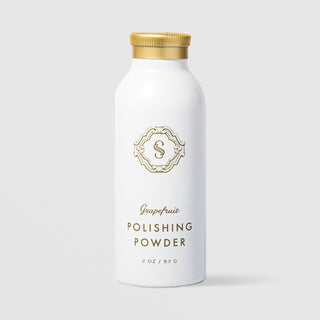 Sorella Apothecary Grapefruit Polishing Powder 2 oz in a white powder bottle with gold ribbed cap on a light gray background