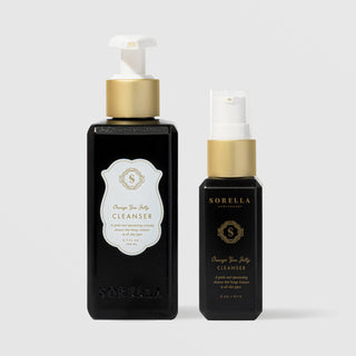 Sorella Apothecary Orange You Jelly Cleanser shown in both 5.7 oz and 2 oz black pump bottle sizes on a light gray backgroun