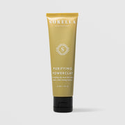 Sorella Apothecary Purifying Powerclay Mask (2 oz / 57g) in an olive gold squeeze tube with white logo and lettering and a black cap, displayed upright against a light gray background