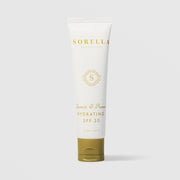 Sorella Apothecary Quench and Protect Hydrating SPF 30 2 oz in a white tube with gold cap on a light gray background