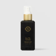 Sorella Apothecary Spiced Wine Toner 4 fl oz in a black pump bottle with gold collar on a light gray background