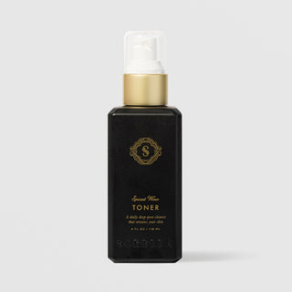 Sorella Apothecary Spiced Wine Toner 4 fl oz in a black pump bottle with gold collar on a light gray background