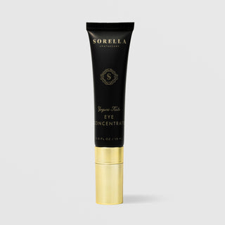 Sorella Apothecary Yogurt Kale Eye Concentrate (0.5 fl oz / 15 ml) in a matte black tube with gold logo and lettering and a gold cap, displayed upright against a light gray background