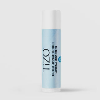 TiZO Tinted Lip Protection Mineral Sunscreen SPF 45 in light blue lip balm stick with white cap