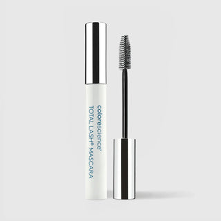 Colorescience Total Lash Mascara white tube with silver cap open showing black mascara wand and hourglass-shaped brush