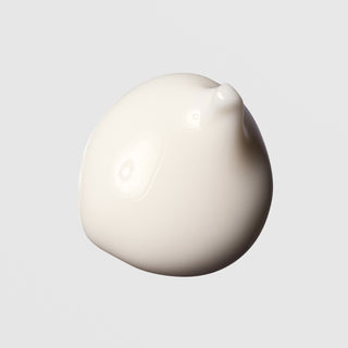 Face Reality Brighten-C Mask texture swatch – thick creamy white formula on light gray background