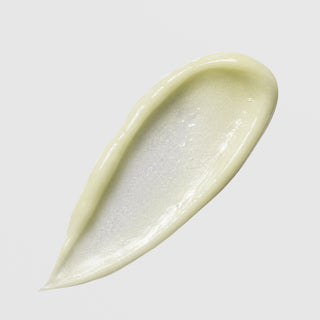 Face Reality Sulfur Spot Treatment texture swatch – pale yellow-green cream formula on light gray background