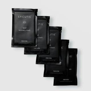 five Epicutis Lipid Recovery Mask for Eyes single-use black foil packets fanned out on a light gray background