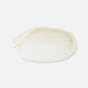 Swatch of Gymed Plus CBD Soothing Serum on a white background.