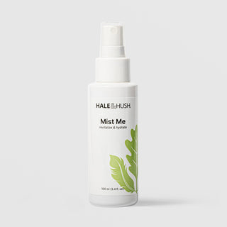 Hale & Hush Mist Me revitalize and hydrate facial mist in a white spray bottle with green leaf botanical design, 100ml / 3.4 fl oz, on a light gray background