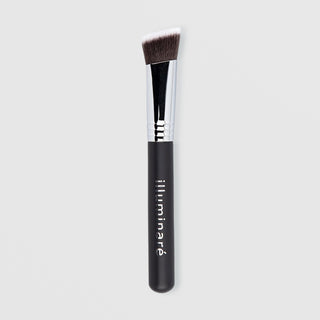 Illuminare flat top angled foundation brush with matte black handle, silver ferrule, and dense dark synthetic bristles