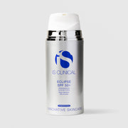 iS Clinical Eclipse SPF 50+ broad spectrum water resistant sunscreen crème in a silver airless pump bottle with white cap