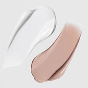 iS Clinical Eclipse SPF 50+ sunscreen texture swatches showing untinted white and tinted beige shades on a light gray background