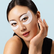 Model wears the Cryo Peptide Eye Masks