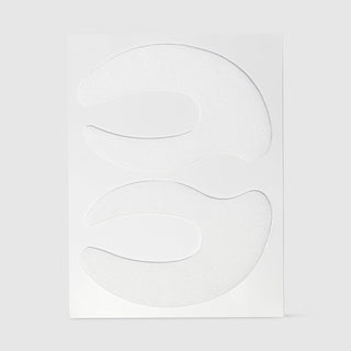 Le Mieux Cryo-Peptide Eye Mask under-eye patches showing two pairs of white crescent-shaped eye patches on backing sheet. Available at Art of Skin Care
