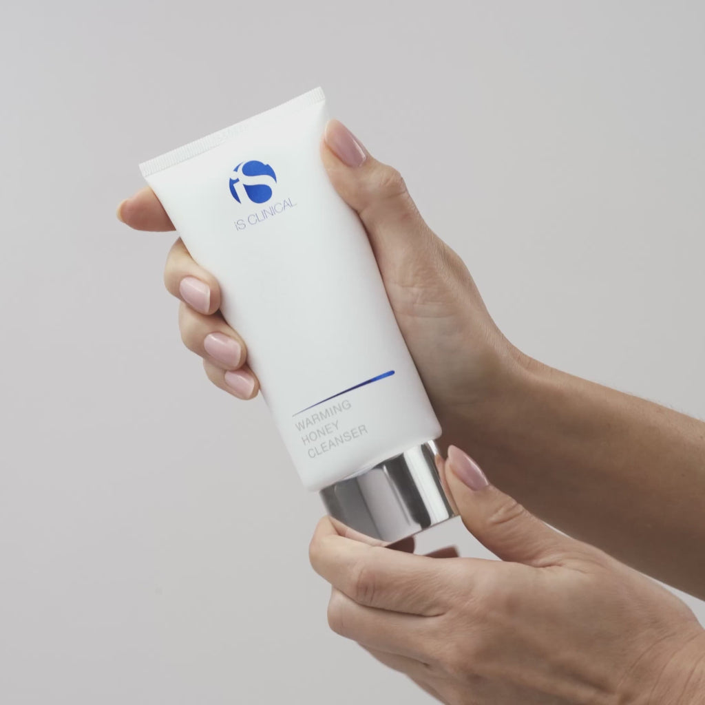 video of iS Clinical Warming Honey Cleanser being applied to hands