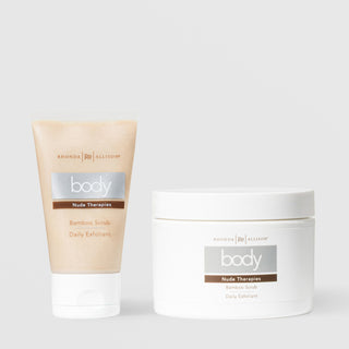 Rhonda Allison Body Nude Therapies Bamboo Scrub Daily Exfoliant shown in both sizes: 2oz beige squeeze tube and 8oz white jar on a light gray background