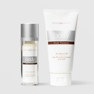 Rhonda Allison Body Nude Therapies Bio Reform 28 Age Reversal Complex with EGF shown in both sizes: 1oz clear airless pump bottle and 4oz white squeeze tube on a light gray background