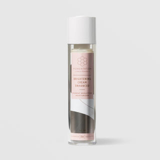 Rhonda Allison Pigmentation Solutions Brightening Cream Enhanced Pigment Reduction Moisturizer in a 50mL clear airless pump bottle with white cap and blush pink label on a light gray background