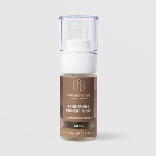 Rhonda Allison Pigmentation Solutions Brightening Pigment Tonic Illuminating Toner in a 30mL pump bottle with clear cap and warm brown honeycomb label on a light gray background