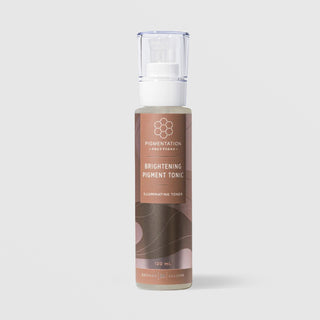 Rhonda Allison Pigmentation Solutions Brightening Pigment Tonic Illuminating Toner in a 120mL pump bottle with clear cap and warm brown honeycomb label on a light gray background