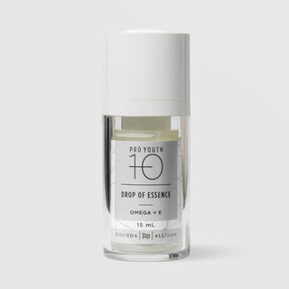 Rhonda Allison Pro Youth 10 Drop of Essence Omega and Vitamin E facial oil in a 15mL clear airless pump bottle with white cap and silver botanical label on a light gray background