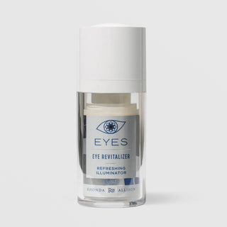 Rhonda Allison Eyes Eye Revitalizer Refreshing Illuminator eye cream in a 15mL clear airless pump bottle with white cap and silver and navy blue label on a light gray background