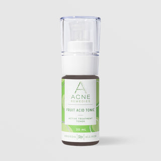 Rhonda Allison Acne Remedies Fruit Acid Tonic Active Treatment Toner in a 30mL pump bottle with clear cap and bright green label on a light gray background