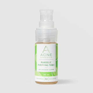 Rhonda Allison Acne Remedies Mandelic Purifying Tonic Antioxidant Clear 30 mL in a clear pump bottle with translucent pump head and green circular patterned label on a light gray background