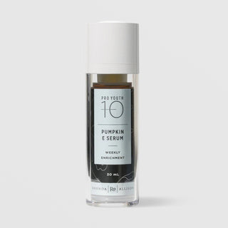Rhonda Allison Pro Youth 10 Pumpkin E Serum Weekly Enrichment 30 mL in a clear airless pump bottle with white cap showing dark amber serum inside and a light blue botanical label on a light gray background