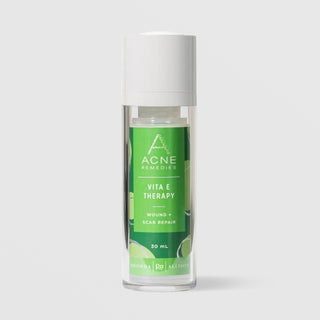 Rhonda Allison Acne Remedies Vita E Therapy Wound and Scar Repair 30 mL in a clear airless pump bottle with white cap and green circular patterned label on a light gray background